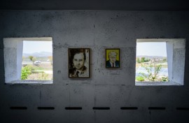 Hung between the bunker's narrow loopholes overlooking the North are cartoonist Kim Dae-nyeon's arwork