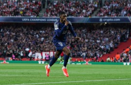 Paris Saint-Germain's Ousmane Dembele celebrates scoring against Arsenal