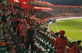 Spectators leave after the Indian Premier League match between Punjab Kings and Delhi Capitals was abandoned