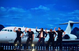 Estonian singer Tommy Cash (C) made it through to the Eurovision final with his song 'Espresso Macchiato'