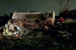 Local residents search through tornado damage in Laurel County near London, Kentucky