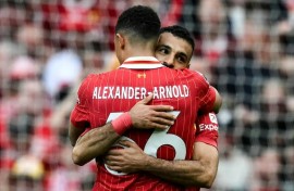 Mohamed Salah (R) celebrates with Trent Alexander-Arnold after equalising for Liverpool against Crystal Palace.