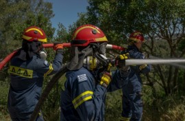 Volunteer firefighters are holding practice drills to prepare for fire season in the Athens suburbs