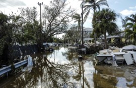 A flooded street with debris in the aftermath of Hurricane Milton, in Siesta Key, Florida, on October 10, 2024