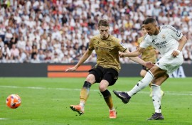 Golden finish: Kylian Mbappe scoring his second goal, and his last of the league season, as Real Madrid beat Real Sociedad