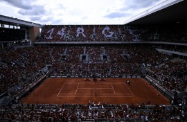 Organisers handed out free T-shirts to fans for Rafael Nadal's ceremony at Roland Garros