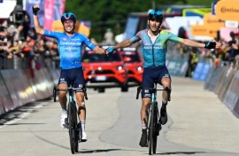 Christian Scaroni (R) crossed the finish line with Astana teammate Lorenzo Fortunato but claimed victory in stage 16 of the Giro d'Italia