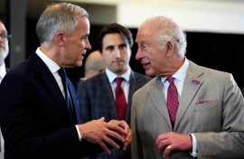 Canada's Prime Minister Mark Carney (L) has said he intends to use the visit of Britain's King Charles III to highlight Canada's sovereignty