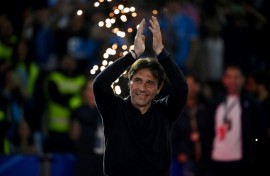 Antonio Conte will stay on as Napoli coach after winning the Serie A title