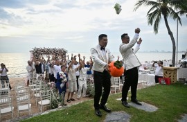 Song and Wang were surrounded by dozens of close friends and their ring-bearing small fluffy dog on their wedding day