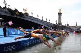 Athletes dive into the Seine during the Paris 2024 Olympic Games