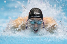 Gretchen Walsh wins the women's 100m butterfly at the US Swimming Championships, selection meet for the 2025 World Championships in Singapore