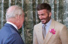 Britain's King Charles III speaks with former England captain David Beckham at the Chelsea Flower Show in London in May 2025