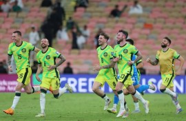 Australia's players celebrate reaching the World Cup