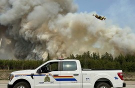 More than 220 wildfires are burning across Canada, with 3.3 million hectares (12,700 square miles) already consumed so far this year