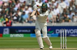 Australia's Mitchell Starc drives during his 58 not out against South Africa in the WTC final at Lord's