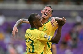 Iqraam Rayners celebrates with Brazilian teammate Arthur Sales after scoring for Mamelodi Sundowns against Ulsan HD at the Club World Cup