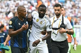 Real Madrid's Antonio Rudiger (centre) leaves the field after accusing an opponent of making a racist remarks at the end of Sunday's Club World Cup match against Pachuca