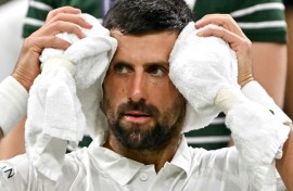 Serbia's Novak Djokovic kept his cool during his first-round win at Wimbledon