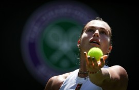 Carlos Alcaraz celebrates beating Oliver Tarvet at Wimbledon