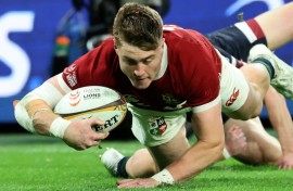 British and Irish Lions wing Tommy Freeman scores against Queensland Reds