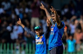 Sri Lanka's Asitha Fernando celebrates after taking the wicket of Bangladesh's Shamim Hossain