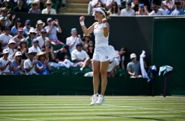Germany's Laura Siegemund celebrates after beating Madison Keys at Wimbledon