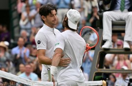 Australia's Jordan Thompson (right) was forced to retire from his Wimbledon fourth-round match against Taylor Fritz with an injury