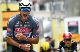 Alpecin - Deceuninck team's Dutch rider Mathieu van der Poel cycles to the finish line to win the 2nd stage of the Tour de France