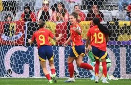 Alexia Putellas (C) celebrating with Esther Gonzalez (9) and Vicky Lopez (19) after scoring the opening goal for Spain against Belgium