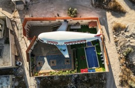 This aerial view shows a guest house built in the shape of an aeroplane in the Palestinian town of Qaffin, in the northwest of the occupied West Bank
