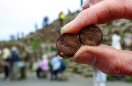 Visitors have been leaving coins in cracks at the Giant's Causeway in Northern Ireland