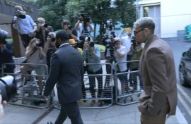 US R&B artist Chris Brown arrives at UK court for assault plea