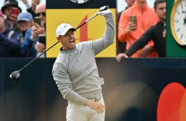Rory McIlroy hit a wayward drive on the first tee