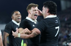 New Zealand's Du'Plessis Kirifi (right) celebrates his try against France with Ruben Love (centre) in Hamilton