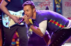 Coldplay's Chris Martin said after the canoodling couple were featured on the jumbotron: "Either they're having an affair or they're just very shy"