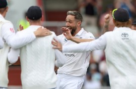 England captain Ben Stokes (L) celebrates after scoring a century in the fourth Test against India at Old Trafford