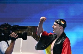 Germany's swimmer Lukas Maertens celebrates after winning the final of the men's 400m freestyle
