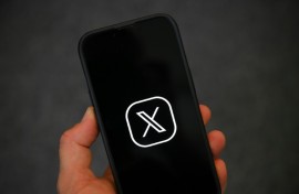 Elon Musk-owned social network X has introduced age checks as required in Britain designed to protect children from pornography but lashed out that 'oversight becomes overreach' that infinges on free expression