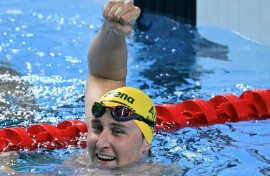 Australia's swimmer Cameron McEvoy celebrates winning the final of the men's 50m freestyle