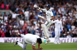 India's Akash Deep celebrates his fifty in the fifth Test against England at the Oval