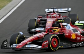 Ferrari's Lewis Hamilton (foreground) and teammate Charles Leclerc during practice at the Hungaroring