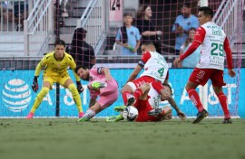 Argentine star Lionel Messi of Inter Miami tumbles to the pitch moments before he is removed with an injury during a Leagues Cup match against visiting Necaxa
