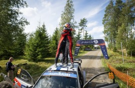Finnish driver Kalle Rovanpera (R) won his home rally for the first time to raise his hopes of a third world title