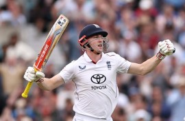 England's Harry Brook celebrates his century in the fifth Test against India at the Oval