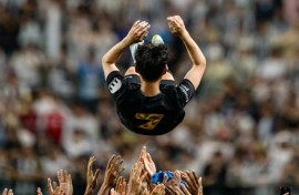 Teammates throw Tottenham Hotspur's captain Son Heung-min up in the air