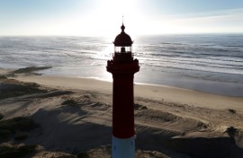 This aerial picture shows a French lighthouse threatened by coastal erosion
