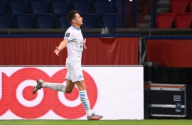 Florian Thauvin celebrates after scoring for Marseille against Paris Saint-Germain in 2020