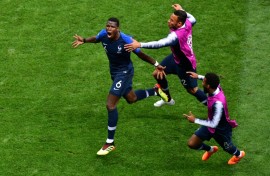 Paul Pogba celebrates scoring in the 2018 World Cup final in Moscow on July 15, 2018