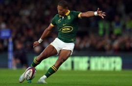 South Africa fly-half Manie Libbok takes a kick at goal.